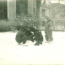 Small children playing in the snow, The University of Iowa, January 1938