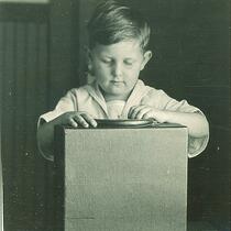 Boy playing with a box, The University of Iowa, 1920s