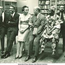 Members of Black Writers panel chatting, Countee Cullen Branch of New York Public Library, New York, N.Y., May 1963