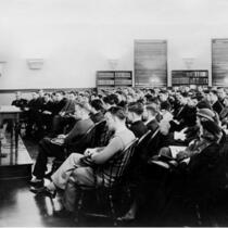 Benjamin F. Shambaugh lecturing to a roomful of students, 1930s