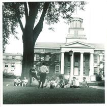 Class being held on the east lawn in front of the Old Capitol, The University of Iowa, 1965