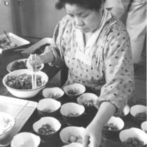 Sugihara Yoshie preparing a meal, Shinkyo commune, Nara-ken, Japan, 1965