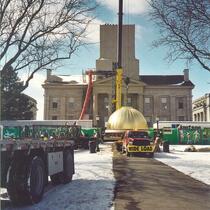 New wood dome with gold leaf being placed on Old Capitol, The University of Iowa, February 24, 2003