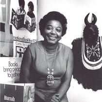 Esther Walls with International Book Year and reading promotion posters, 1972