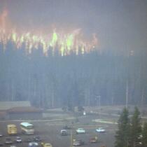 Crown fire approaching parking lot of geyser basin