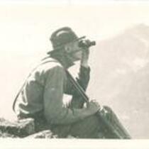 Expedition member Robert A. Brown looking for goats, The University of Iowa, 1920